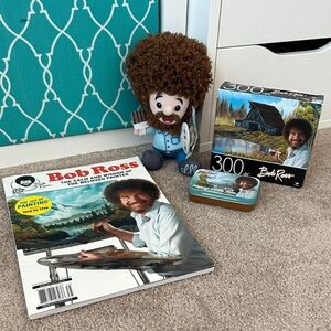 Bob Ross Collectible Set with Magazine and Puzzle, mints, and plush toy.